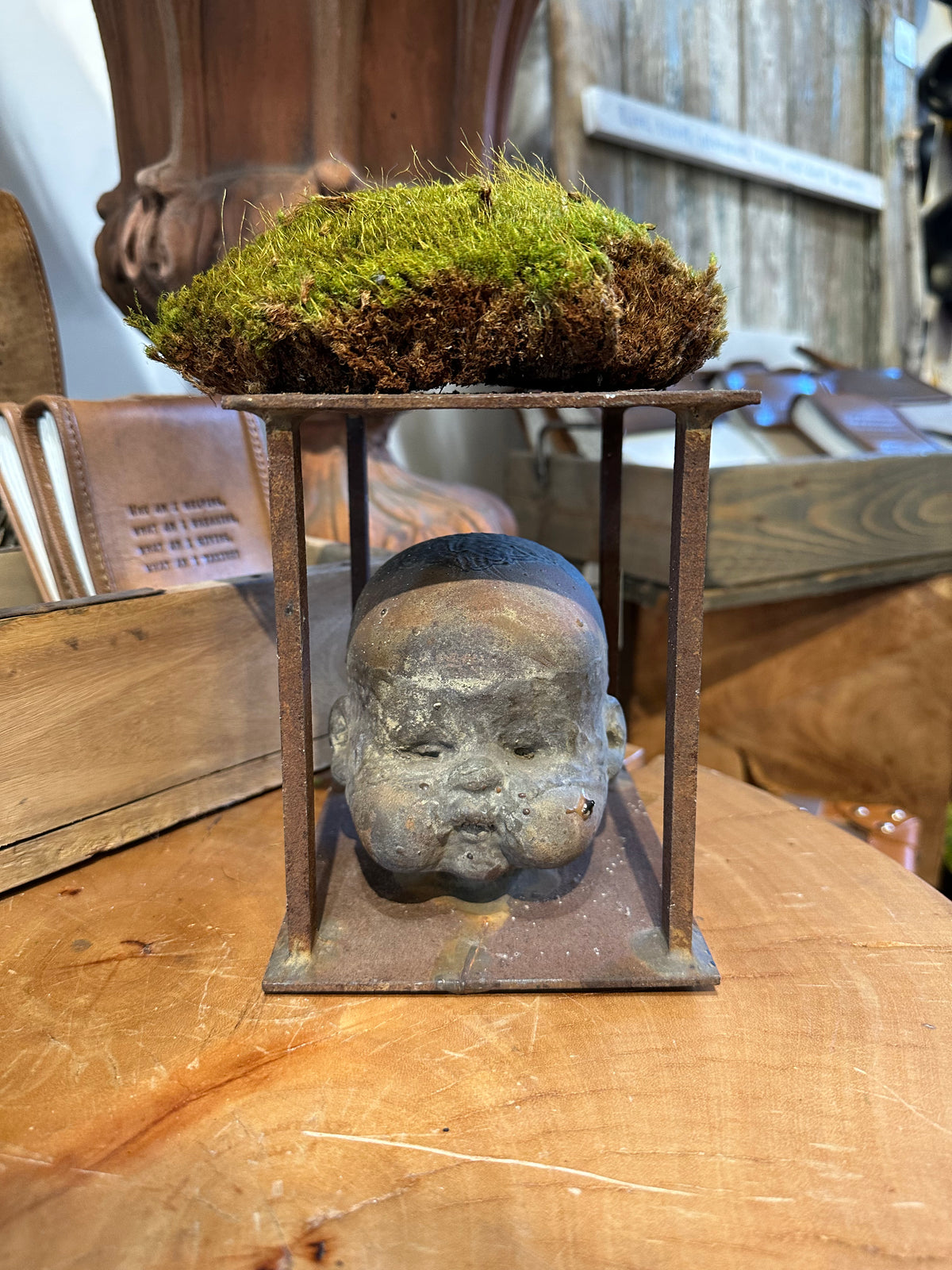 Baby doll head mold sculpture