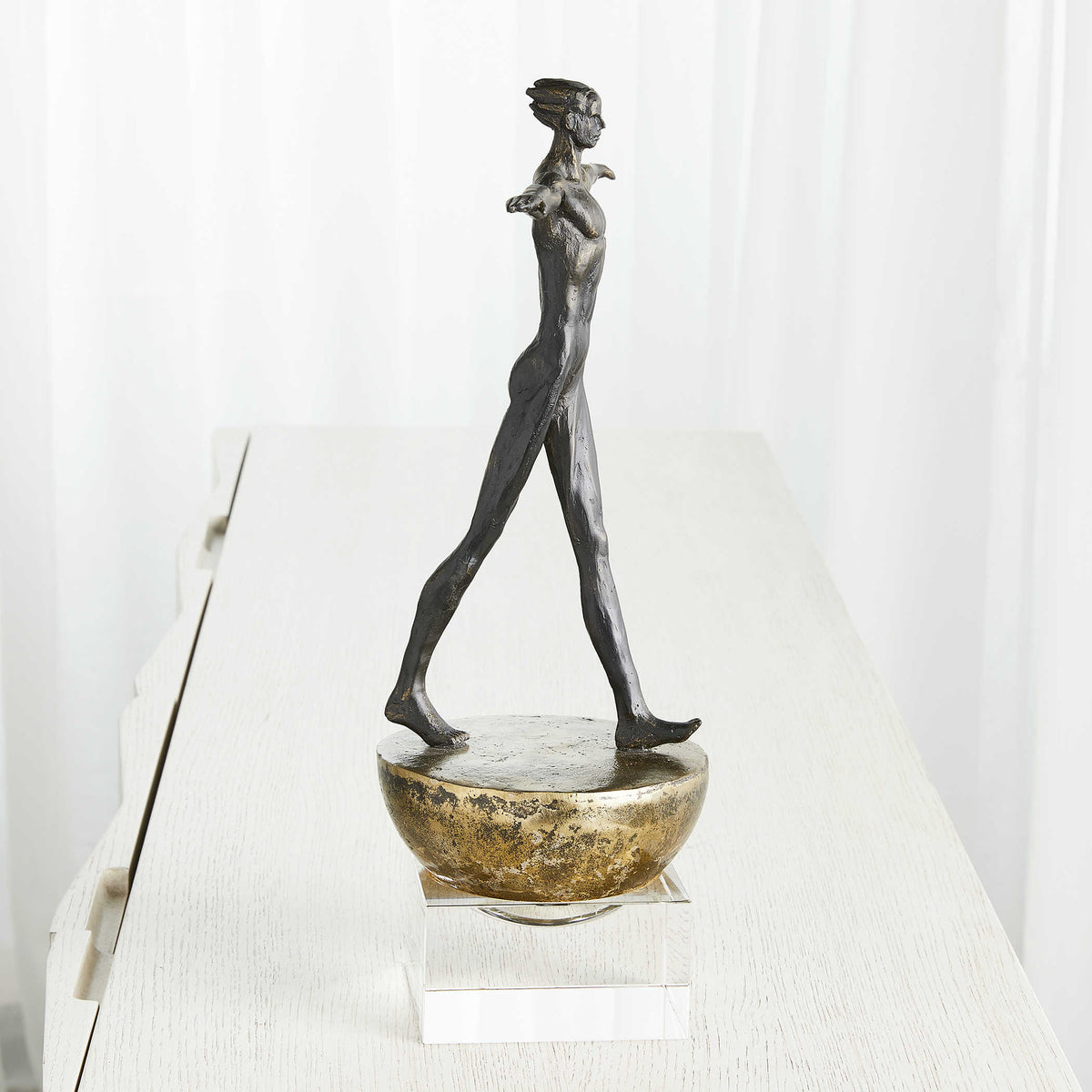 Man Finding Balance Sculpture