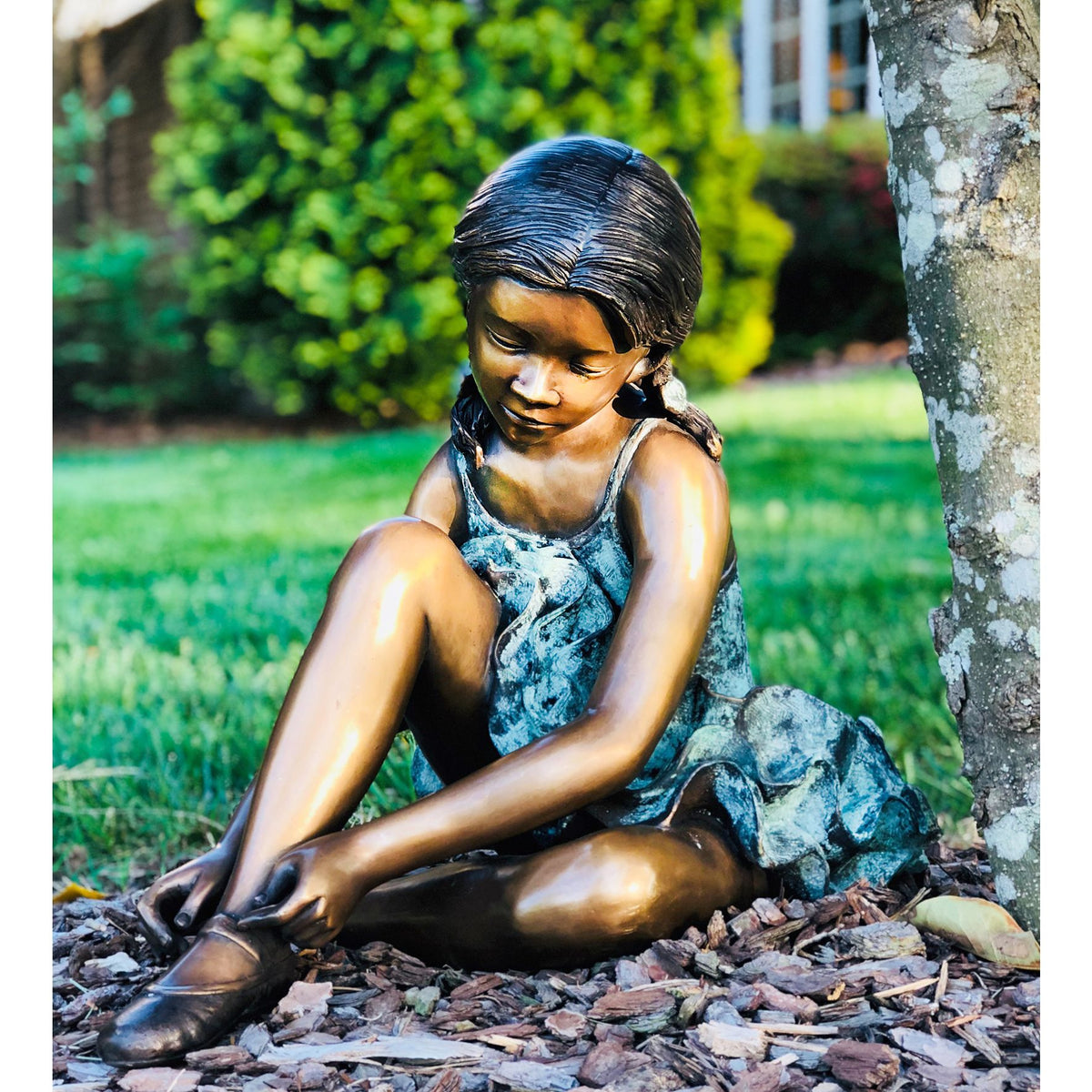 Bronze Ballerina Fixing Shoe Sculpture